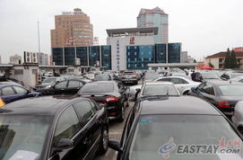 滬私車過戶新規出臺 二手市場有點淡 競拍標書或熱銷